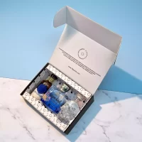 Estuche premium con Vodka Crystal Head, Tequila Campo Azul Selecto y Ron La Hechicera. Un regalo elegante y exclusivo para verdaderos amantes del licor – 78 Grados Deluxe