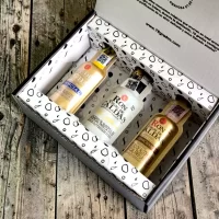 Descubre Esencia Ron Viejo de Caldas, un estuche premium con mini botellas de ron colombiano ideal para regalos, degustaciones y coleccionistas.