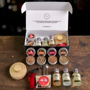 Kit premium para ahumar tequila con El Padrino Blanco, Reposado y Añejo. Incluye ahumador, soplete, astillas aromáticas, frutas deshidratadas y estuche personalizable.